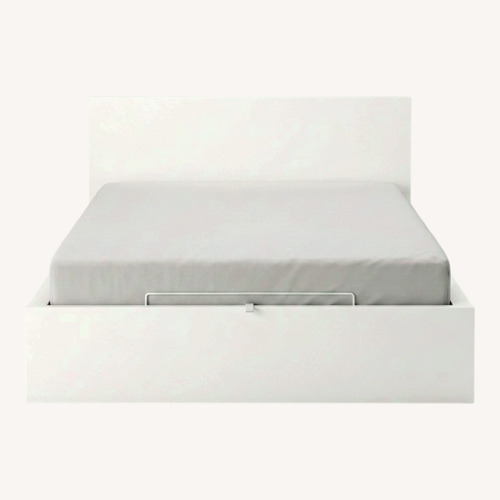 Used IKEA MALM Queen Lift Storage Bed/Headboard for sale on AptDeco