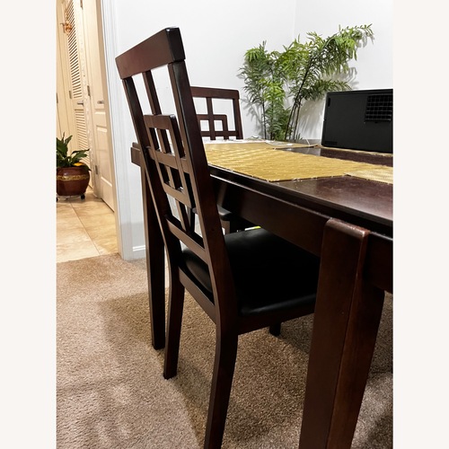 Used Sealey Dark Brown Wood Dining Set for sale on AptDeco