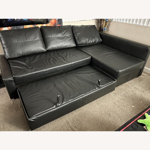 Used IKEA FRIHETEN Black Faux Leather 3+ Piece Sectional for sale on AptDeco