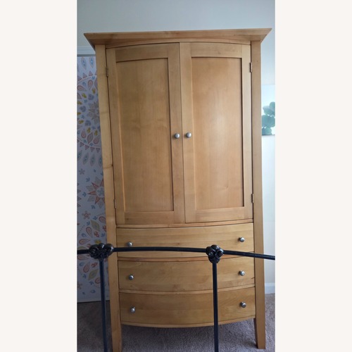Used Crate & Barrel Natural Wood Armoire for sale on AptDeco
