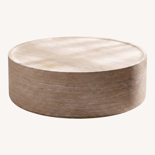 Used Beige Faux Travertine Drum Coffee Table for sale on AptDeco