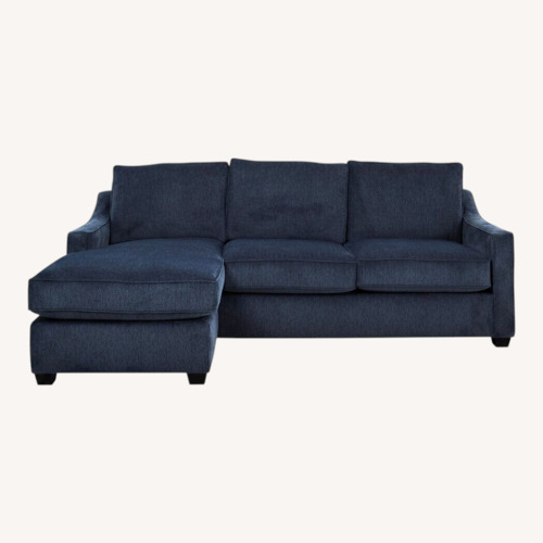 Used Raymour & Flanigan Blue Arro Reversible Sofa Chaise for sale on AptDeco