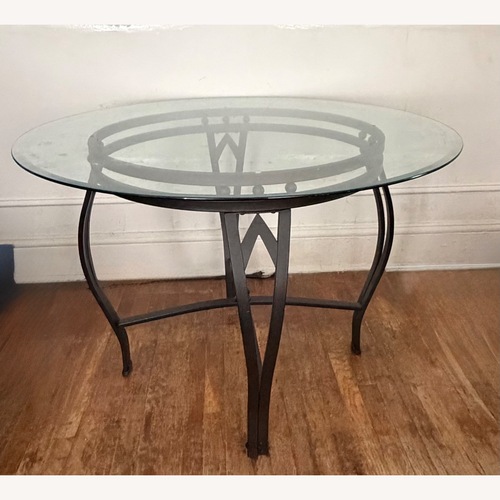 Used Stylish Glass Dining Table for sale on AptDeco