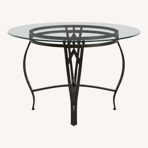 Used Stylish Glass Dining Table for sale on AptDeco