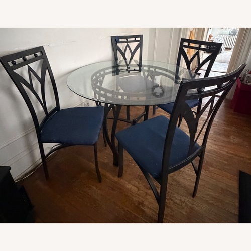 Used Stylish Glass Dining Table for sale on AptDeco