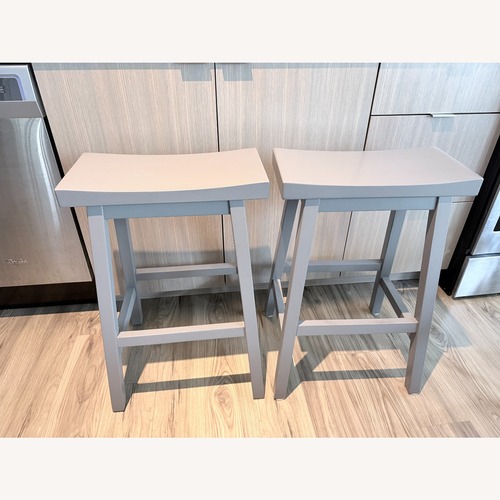 Used Pottery Barn Tibetan Bar Stools, Pair for sale on AptDeco
