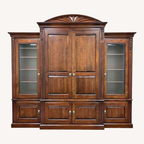Used Dark Brown Wood Armoire for sale on AptDeco