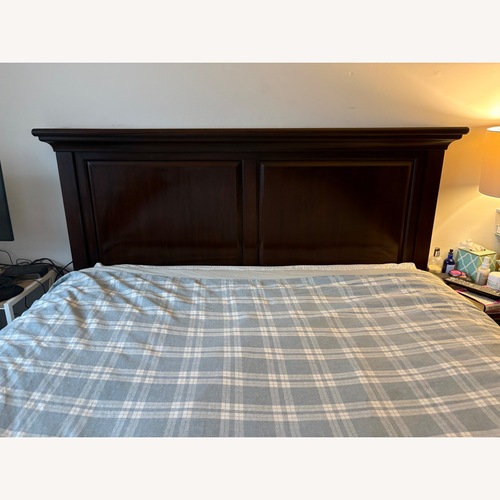 Used Pottery Barn Hudson Dark Brown Wood Queen Bed for sale on AptDeco