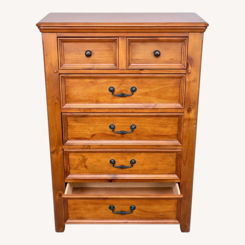 Used Rooms To Go Light Brown Armoire for sale on AptDeco