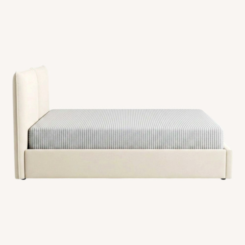 Used Raymour & Flanigan Natural Queen Bed for sale on AptDeco