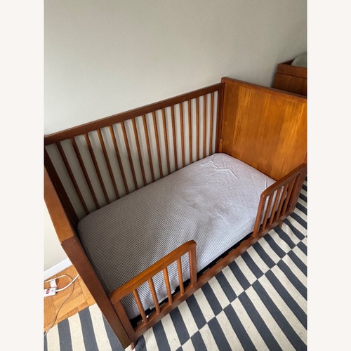 Used West Elm Midcentury Dark Brown Toddler Bed for sale on AptDeco