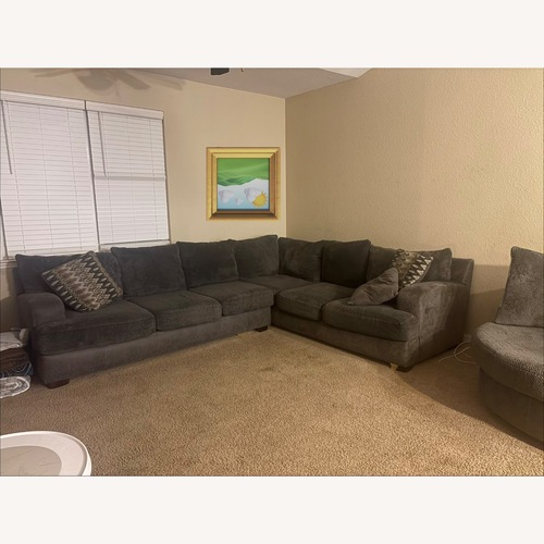 Used Rooms To Go Dark Gray Fabric 3+ Piece Sectional for sale on AptDeco