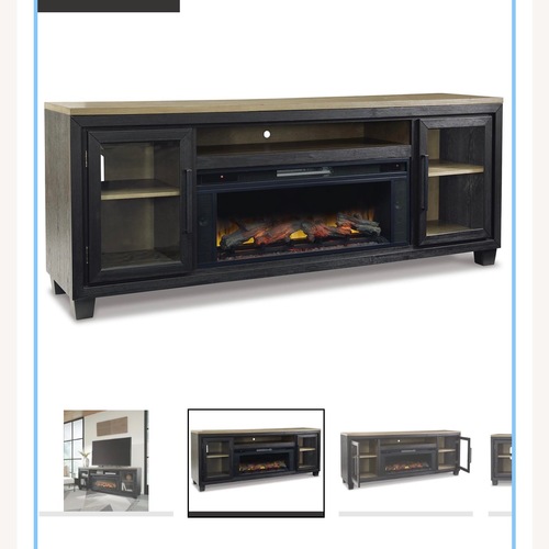 Used Ashley Furniture Foyland 83" TV Stand with Electric Fireplace for sale on AptDeco