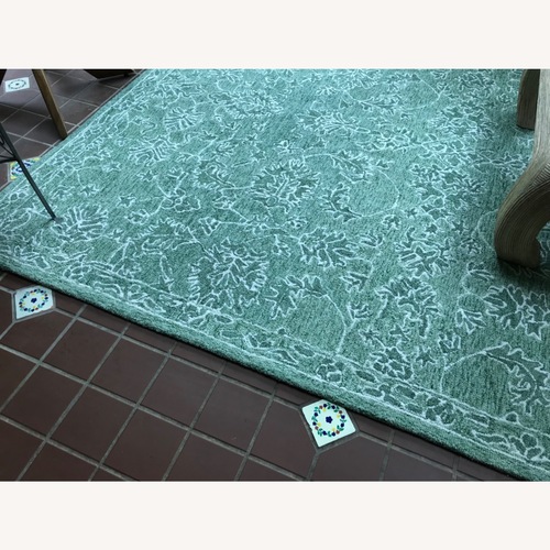 Used 8x10 Sage Green Area Rug  for sale on AptDeco