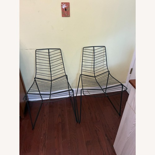 Used Arper Leaf Black/Brown Metal Accent Chairs for sale on AptDeco