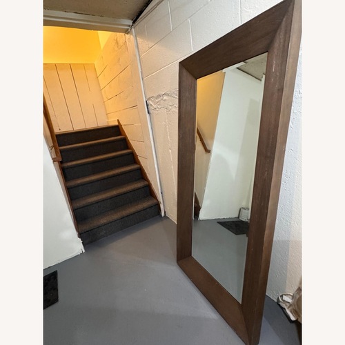 Used Dark Brown Wood Floor Mirror for sale on AptDeco