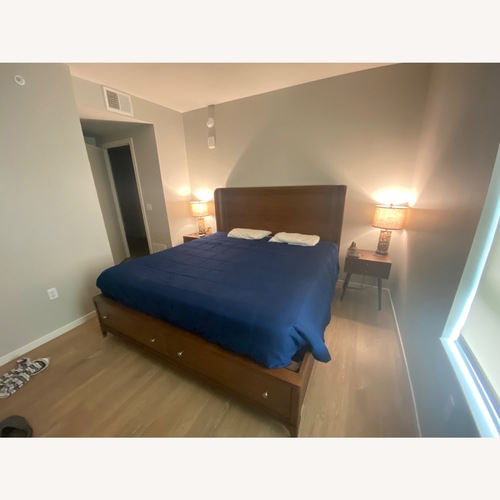 Used Value City Furniture Dark Brown Wood King Bed for sale on AptDeco