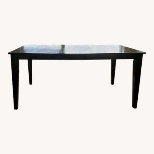 Used Value City Furniture Dark Brown Wood Dining Table for sale on AptDeco