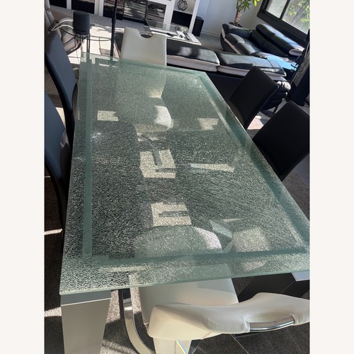 Used Black Dining Table w Glass Top for sale on AptDeco