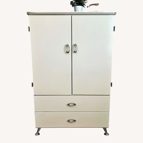 Used Ashley Furniture Vintage Natural Armoire for sale on AptDeco