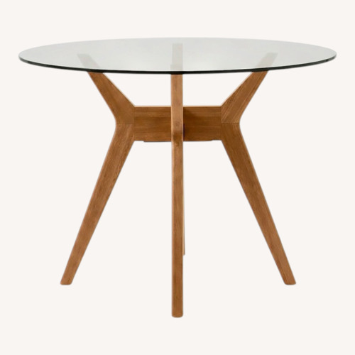 Used West Elm Jensen “42 Round Glass Dining Table for sale on AptDeco