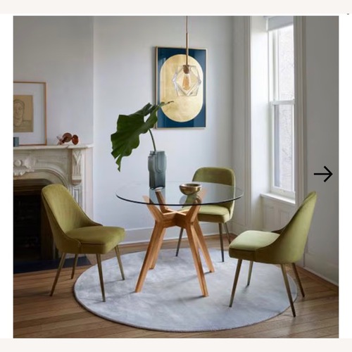 Used West Elm Jensen “42 Round Glass Dining Table for sale on AptDeco