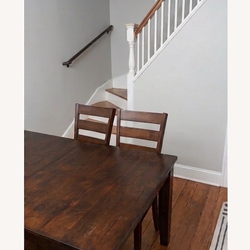 Used Intercon Kona Dark Brown Wood Dining Set for sale on AptDeco