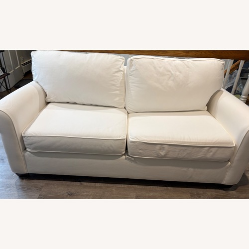 Used Pottery Barn Buchanan White Twill Buchanan Love Seat for sale on AptDeco