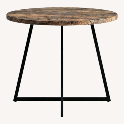 Used Round Wood Finish Style Top Dining Table for sale on AptDeco
