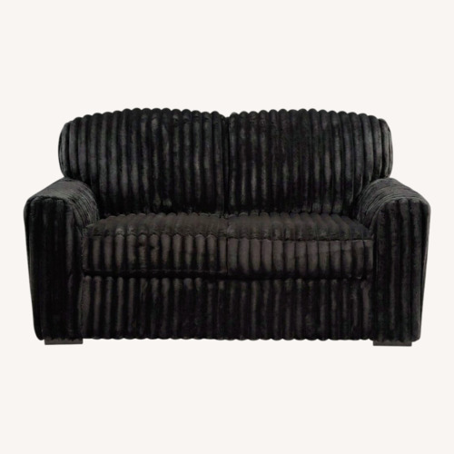 Used Ashley Furniture Onyx Black Loveseat for sale on AptDeco