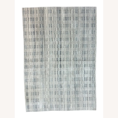 Used Light Gray Wool Area Rug 7' x 10' for sale on AptDeco