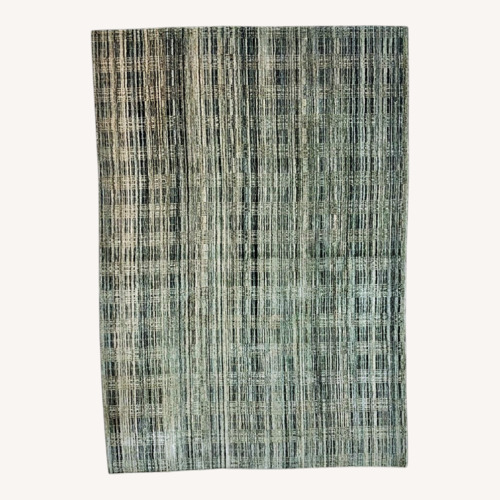 Used Light Gray Wool Area Rug 7' x 10' for sale on AptDeco