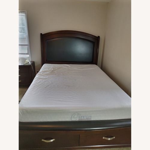Used Bob's Discount Furniture Dark Brown Queen Bed for sale on AptDeco