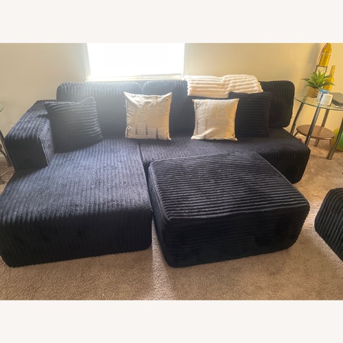 Used Black Fabric 3+ Piece Sectional for sale on AptDeco