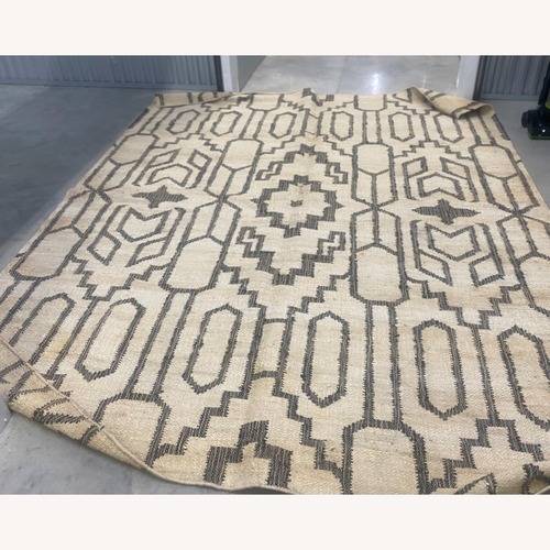 Used Safavieh Natural Jute Area Rug 8' x 10' for sale on AptDeco