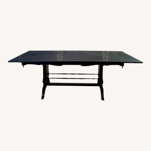 Used Vintage/Antique Finds Black Wood Dining Table for sale on AptDeco