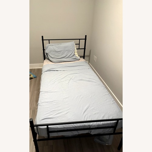 Used Walmart Black Metal Twin Bed with Headboard for sale on AptDeco