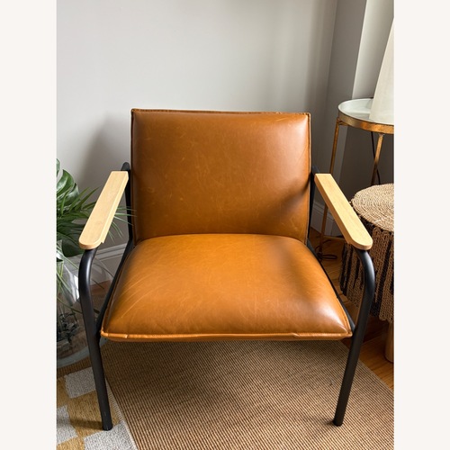 Used Mid-Century Modern Tan Faux Leather Accent Chair for sale on AptDeco