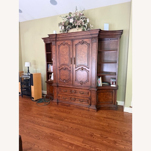 Used Traditional Dark Wood Entertainment Center for sale on AptDeco