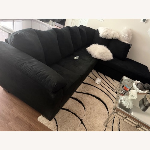 Used Darcy Black Fabric 2 Piece Sectional for sale on AptDeco