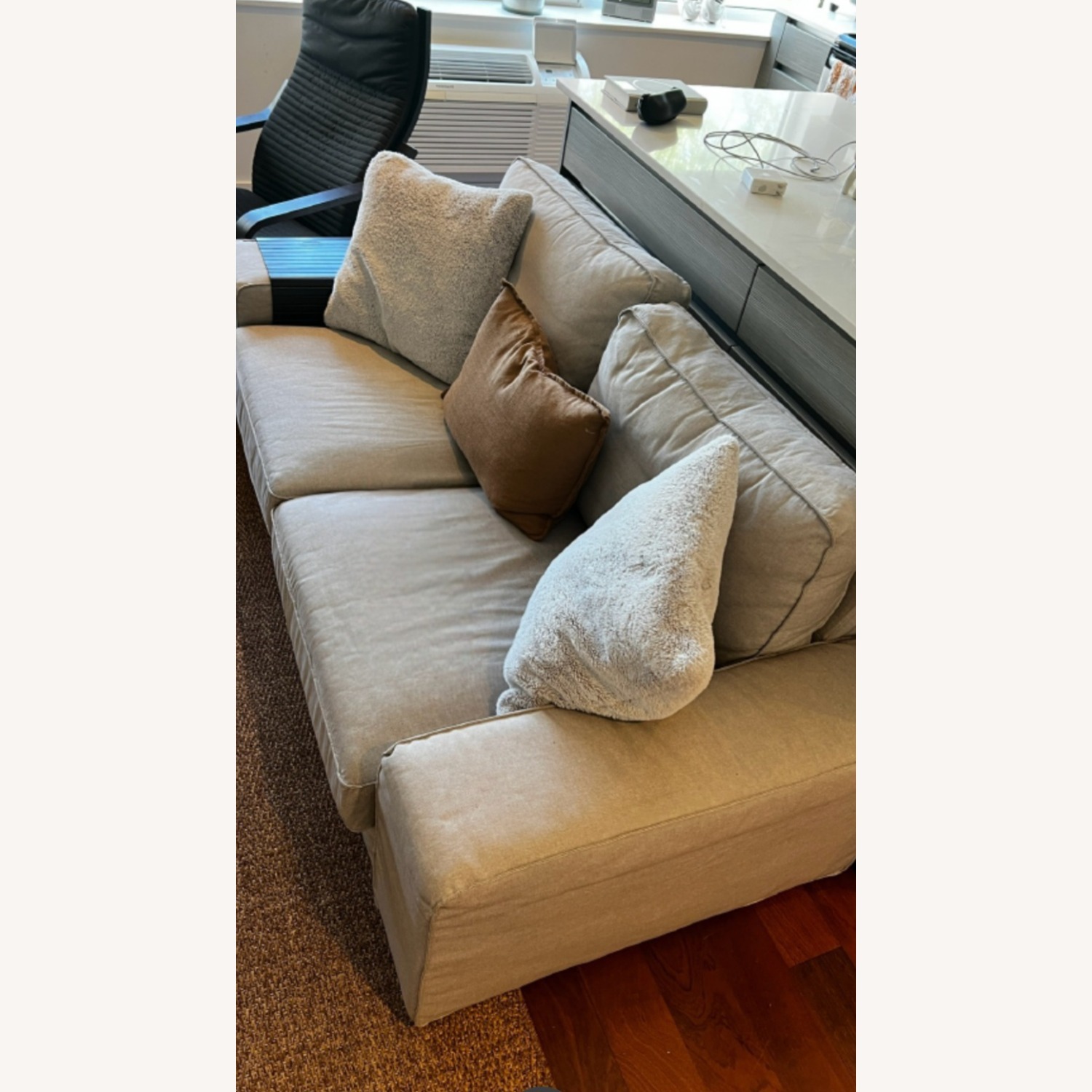 Beige Slipcovered Three-Seat Sofa - image-1