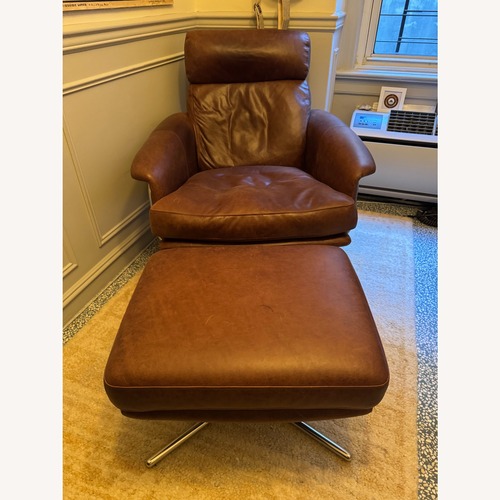 Used West Elm Dark Brown Leather Swivel Chair + Ottoman for sale on AptDeco