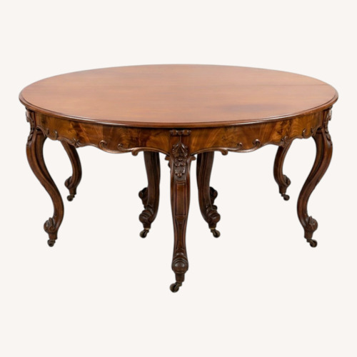Used Vintage/Antique Dark Brown Dining Table for sale on AptDeco