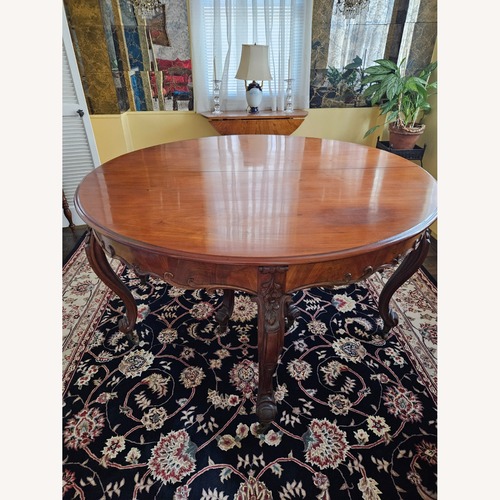 Used Vintage/Antique Dark Brown Dining Table for sale on AptDeco