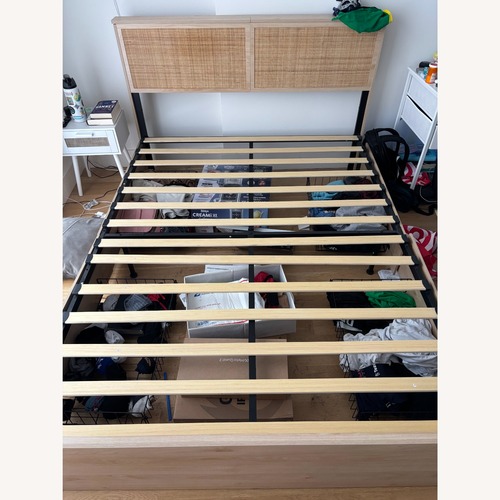 Used Amazon Queen Bed Frame with 4 Storage Drawers for sale on AptDeco