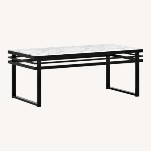 Used Rooms To Go Truanni Black Cocktail Table for sale on AptDeco