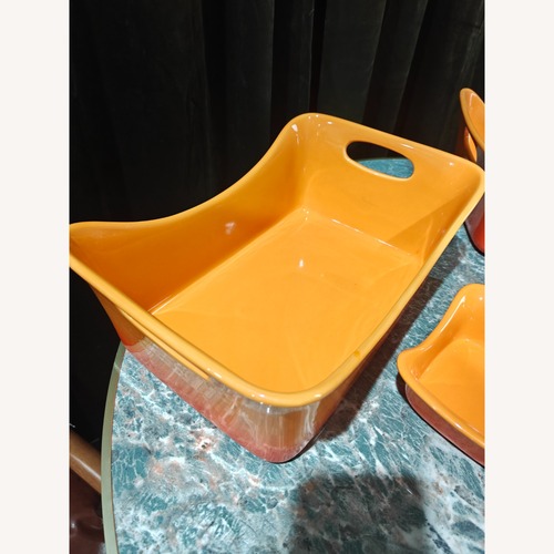 Used  Orange Stoneware Baking 5-Piece Set for sale on AptDeco