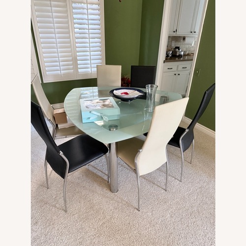 Used Modern Glass Dining Table with 6 Chairs  for sale on AptDeco