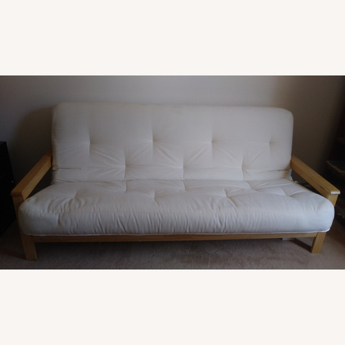 Used Light Brown Wood Futon for sale on AptDeco