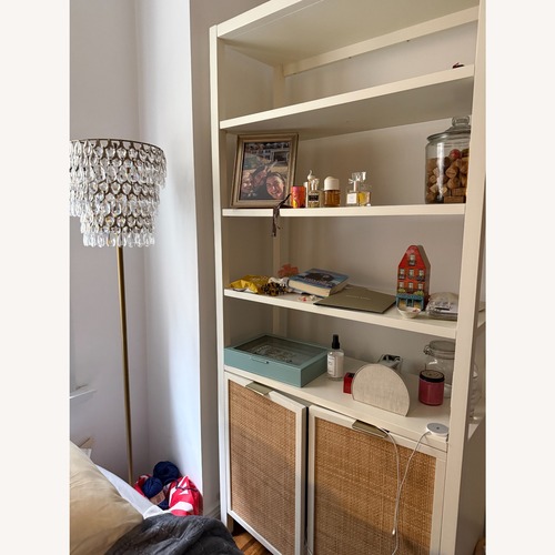 Used Pottery Barn Westly Caned Bookcase for sale on AptDeco